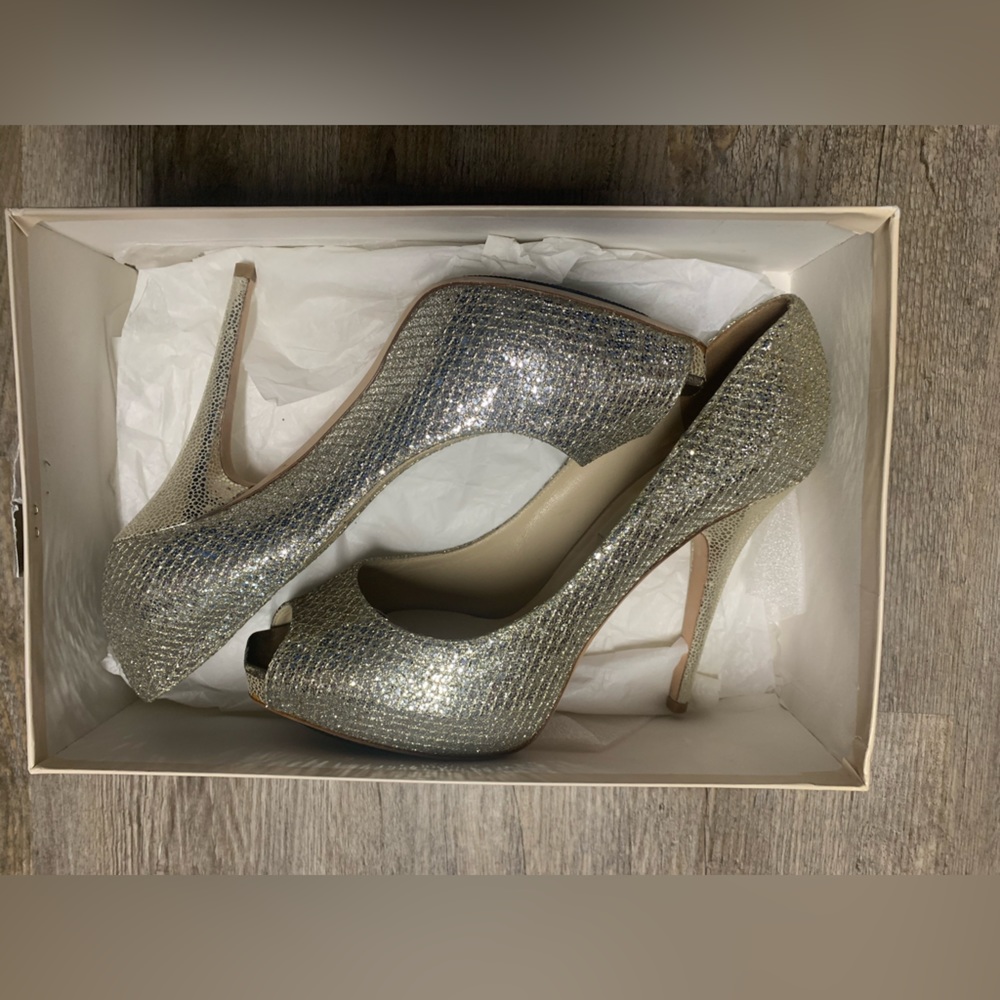 Jimmy Choo size 10. “Champagne” heels.
